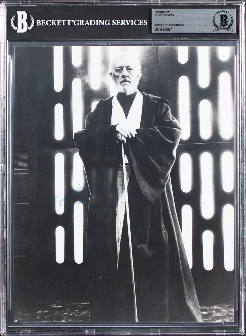 Alec Guinness Signed Star Wars 8x10 Photo with Inscription Beckett Authenticated: Alec Guinness Signed Star Wars 8x10 Photo with Inscription Beckett Authenticated This 8x10 photograph features an authentic signature and the inscription "Good Wishes" by Alec Guinness from Star Wars.