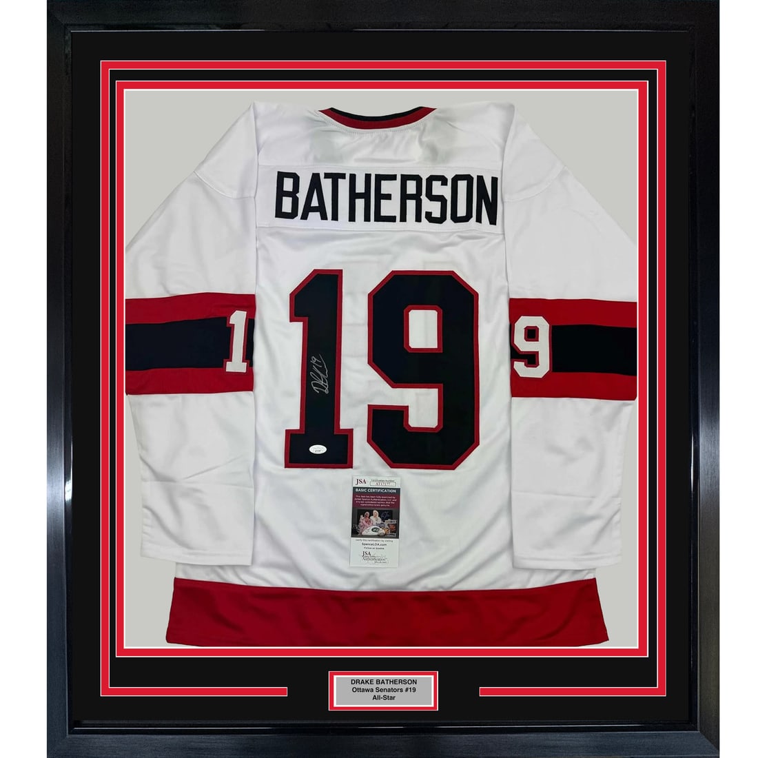 Framed Autographed Drake Batherson Ottawa Senators Jersey with JSA COA: Framed Autographed Drake Batherson Ottawa Senators Jersey with JSA COA Celebrate your passion for hockey with this professionally framed autographed jersey of Drake Batherson, featuring the Ottawa Sen