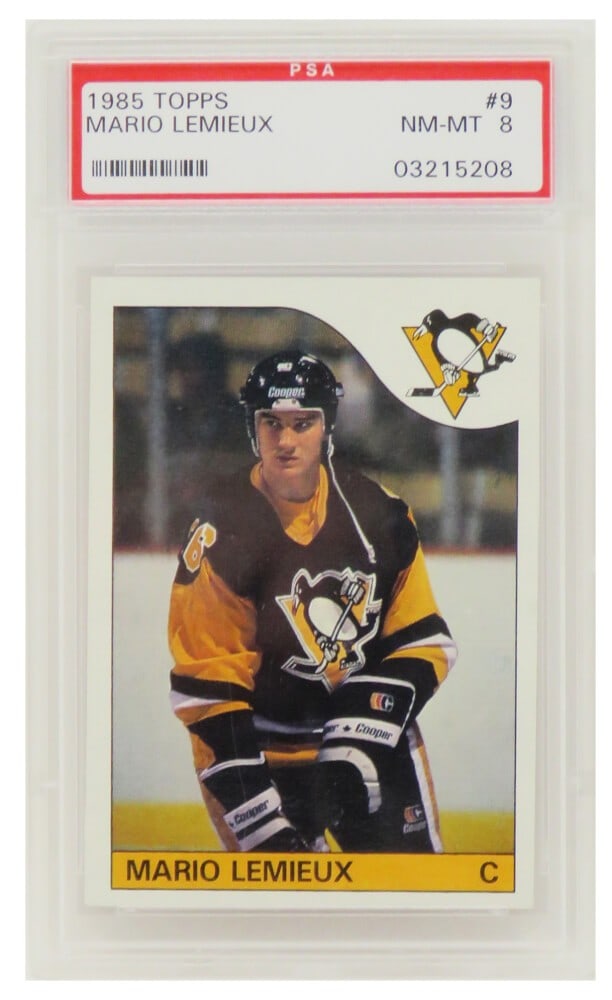 Mario Lemieux 1985 Topps Rookie Card #9 Graded PSA 8 NM-MT: Mario Lemieux 1985 Topps Rookie Card #9 Graded PSA 8 NM-MT This listing features a Mario Lemieux 1985 Topps rookie card, numbered #9, encapsulated and graded as Near Mint-Mint (NM-MT 8) by Professiona