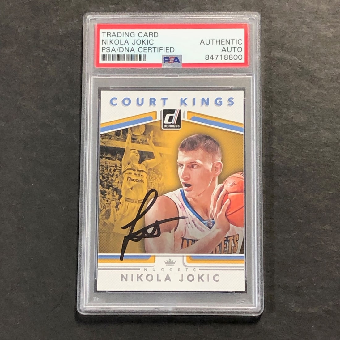 Nikola Jokic Autographed 2017-18 Court Kings Basketball Card PSA Authenticated: Nikola Jokic Autographed 2017-18 Court Kings Basketball Card PSA Authenticated This is a 2017-18 Donruss Court Kings #40 sports trading card featuring Nikola Jokic of the Denver Nuggets. The card is s