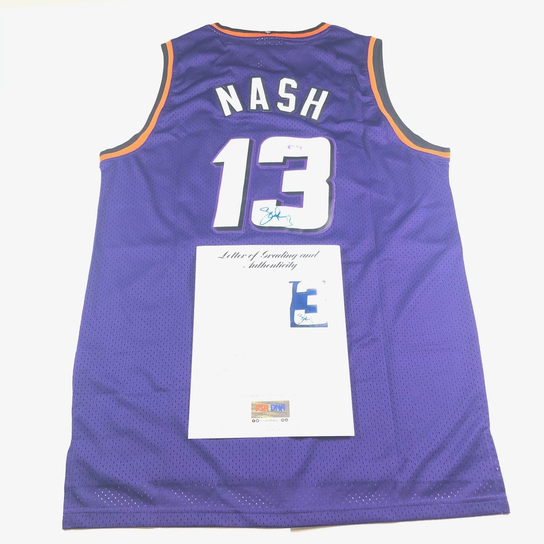 Phoenix Suns Steve Nash autographed jersey PSA DNA 10 LOA: Phoenix Suns Steve Nash autographed jersey PSA DNA 10 LOA This is an original Phoenix Suns jersey autographed by Steve Nash, a renowned player in the NBA. The signature has been authenticated and grad