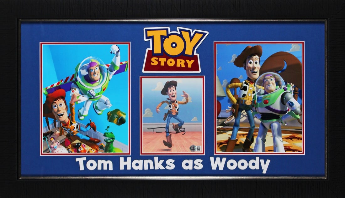 Tom Hanks Autographed Toy Story Framed Display with Beckett Authentication: Tom Hanks Autographed Toy Story Framed Display with Beckett Authentication This authentic framed display features a photograph personally signed by Tom Hanks, renowned for his role in Toy Story. It is