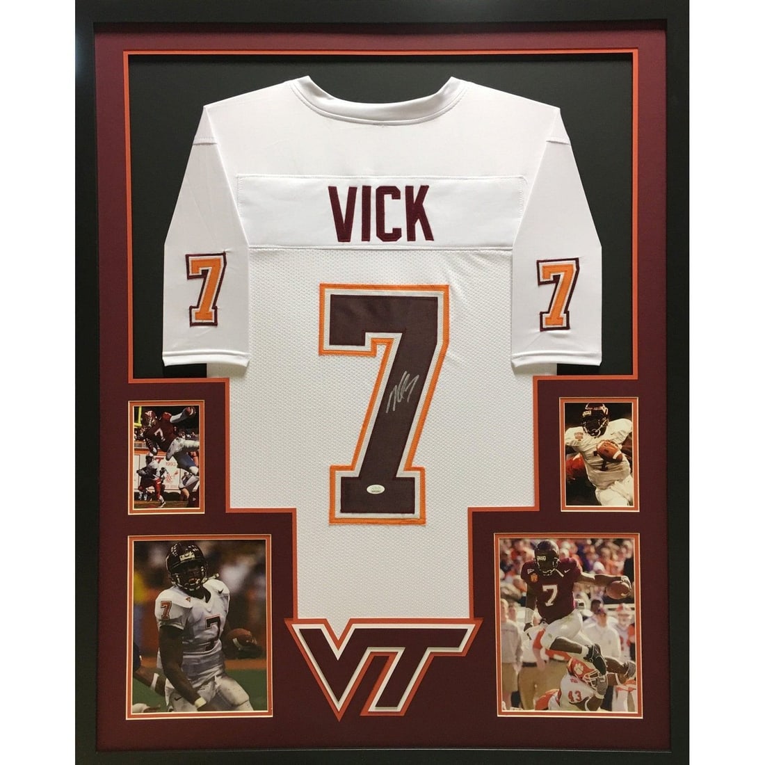 Michael Vick Autographed Framed Jersey Virginia Tech JSA Certified: Michael Vick Autographed Framed Jersey Virginia Tech JSA Certified This is a stunning autographed Michael Vick framed jersey, a must-have for any sports memorabilia collector. The jersey is authentica