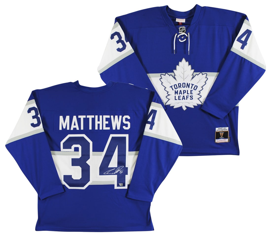 Auston Matthews Signed Blue Vintage Mitchell & Ness Jersey Toronto Maple Leafs: Auston Matthews Signed Blue Vintage Mitchell & Ness Jersey Toronto Maple Leafs Celebrate your love for the Toronto Maple Leafs with this authentic Auston Matthews blue vintage Mitchell & Ness throwbac