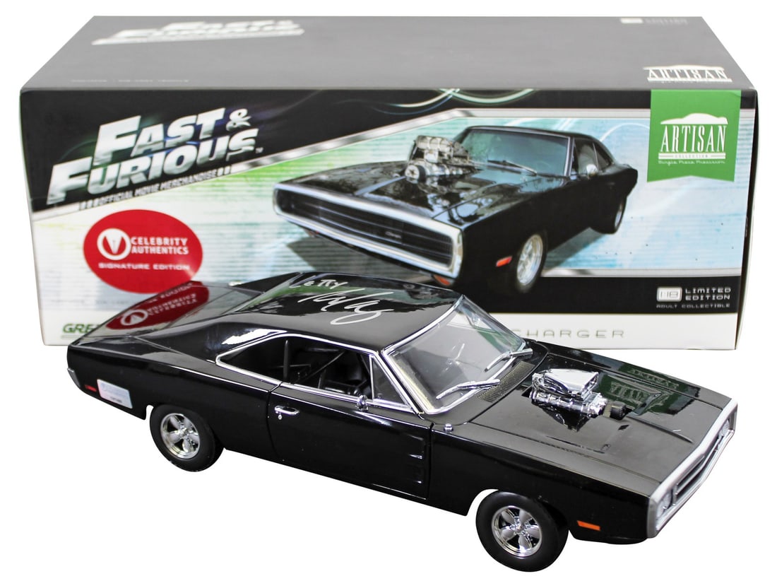 Michelle Rodriguez Signed 1970 Dodge Charger 1:18 Die Cast BAS COA: Michelle Rodriguez Signed 1970 Dodge Charger 1:18 Die Cast BAS COA This stunning 1:18 scale die-cast model of Dom's 1970 Dodge Charger, inspired by 'The Fast & The Furious', is a must-have for collect