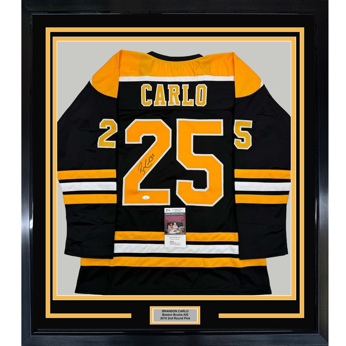 Framed Autographed Brandon Carlo Boston Bruins Jersey with JSA COA 35x39: Framed Autographed Brandon Carlo Boston Bruins Jersey with JSA COA 35x39 Celebrate your passion for hockey with this professionally framed and matted autographed Boston Bruins jersey, signed by player
