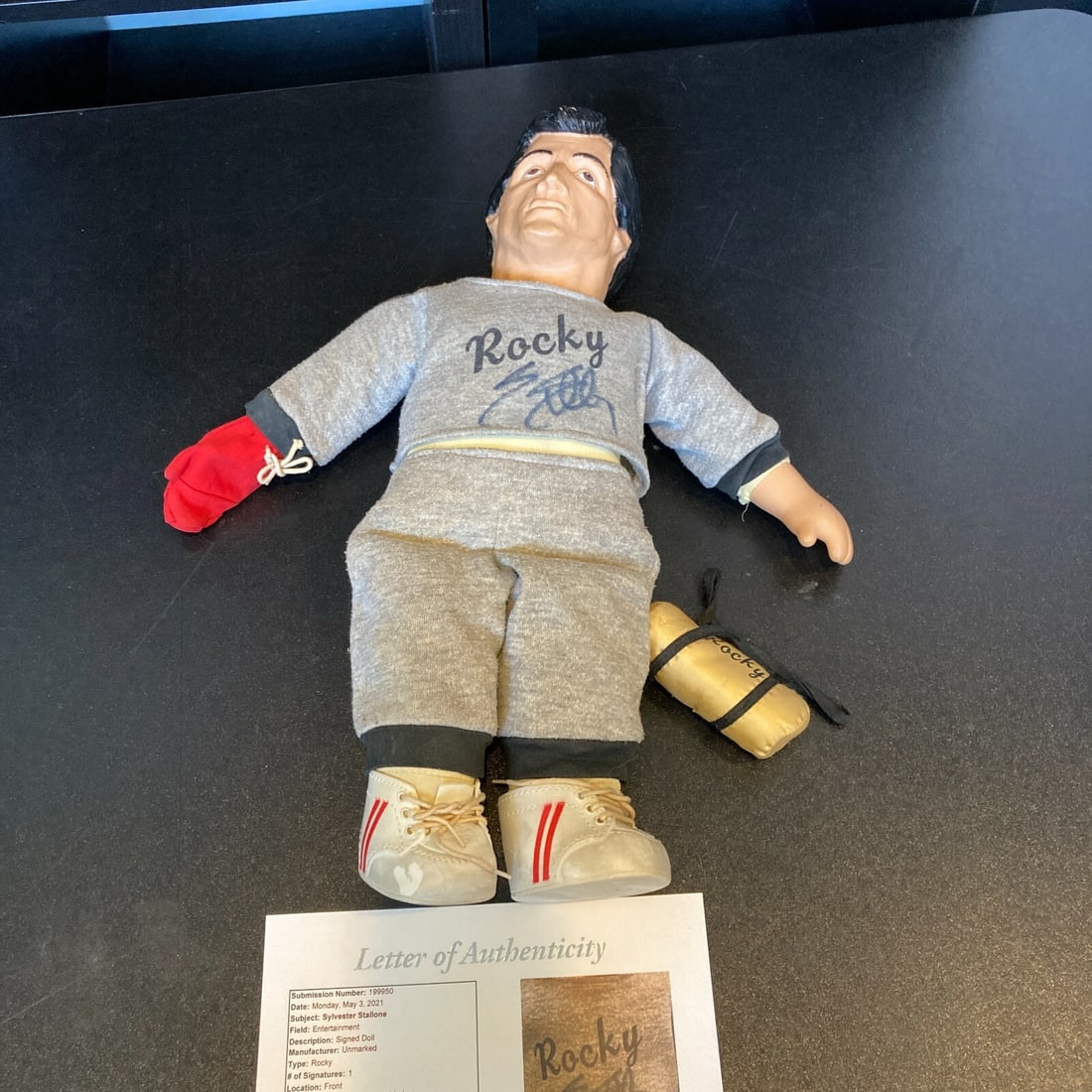1985 Rocky Balboa 18 Inch Doll Signed by Stallone with JSA Full Letter: 1985 Rocky Balboa 18 Inch Doll Signed by Stallone with JSA Full Letter This is a vintage 1985 Rocky Balboa doll figure, measuring 18 inches, signed by Sylvester Stallone. The autograph has been authen