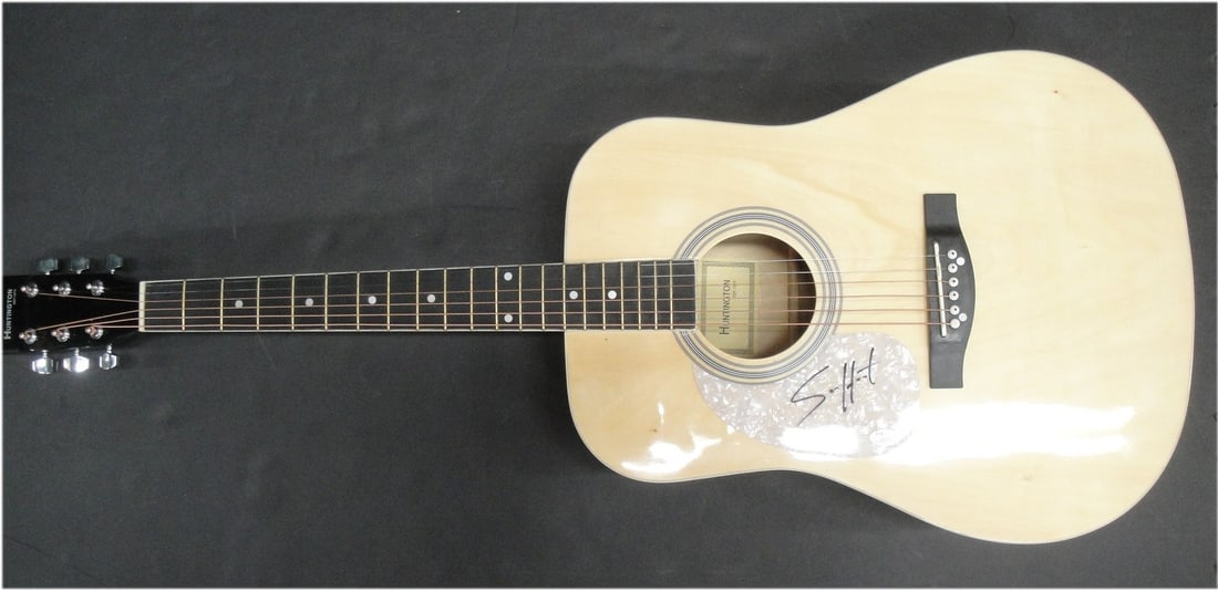Autographed Acoustic Guitar Signed by Sam Hunt JSA Authenticated: Autographed Acoustic Guitar Signed by Sam Hunt JSA Authenticated This acoustic guitar and guitar pick feature the authentic hand signature of Sam Hunt, a renowned rock star. The autograph has been ver