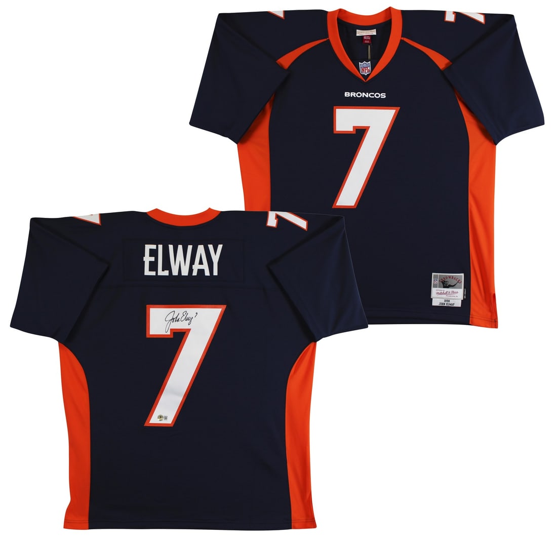 John Elway Signed Navy Throwback Jersey Beckett Witnessed Authentic: John Elway Signed Navy Throwback Jersey Beckett Witnessed Authentic This Denver Broncos navy Mitchell & Ness throwback jersey is personally signed by John Elway. The autograph was witnessed by a Becke