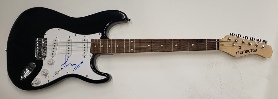 Lizzo Autographed Electric Guitar PSA/DNA Authentic Music Memorabilia: Lizzo Autographed Electric Guitar PSA/DNA Authentic Music Memorabilia This is a stunning electric guitar autographed by the pop superstar Lizzo, complete with authentication from Professional Sports A