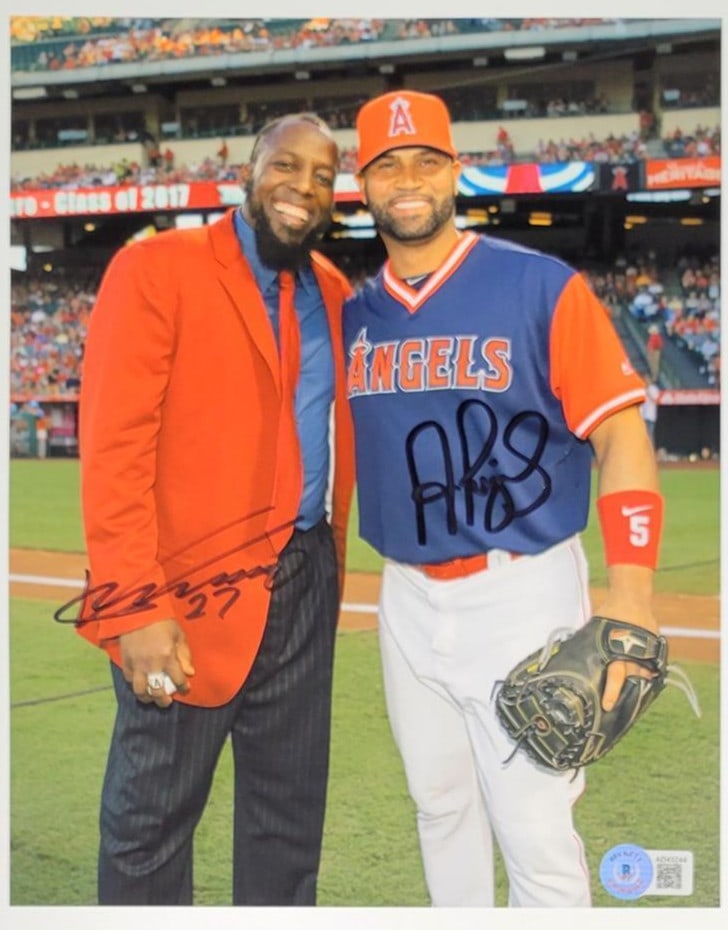 Albert Pujols Vladimir Guerrero Signed 8x10 Angels Photo BAS Certified: Albert Pujols Vladimir Guerrero Signed 8x10 Angels Photo BAS Certified This striking 8x10 photograph features two baseball legends, Albert Pujols and Vladimir Guerrero, both of whom have signed the im