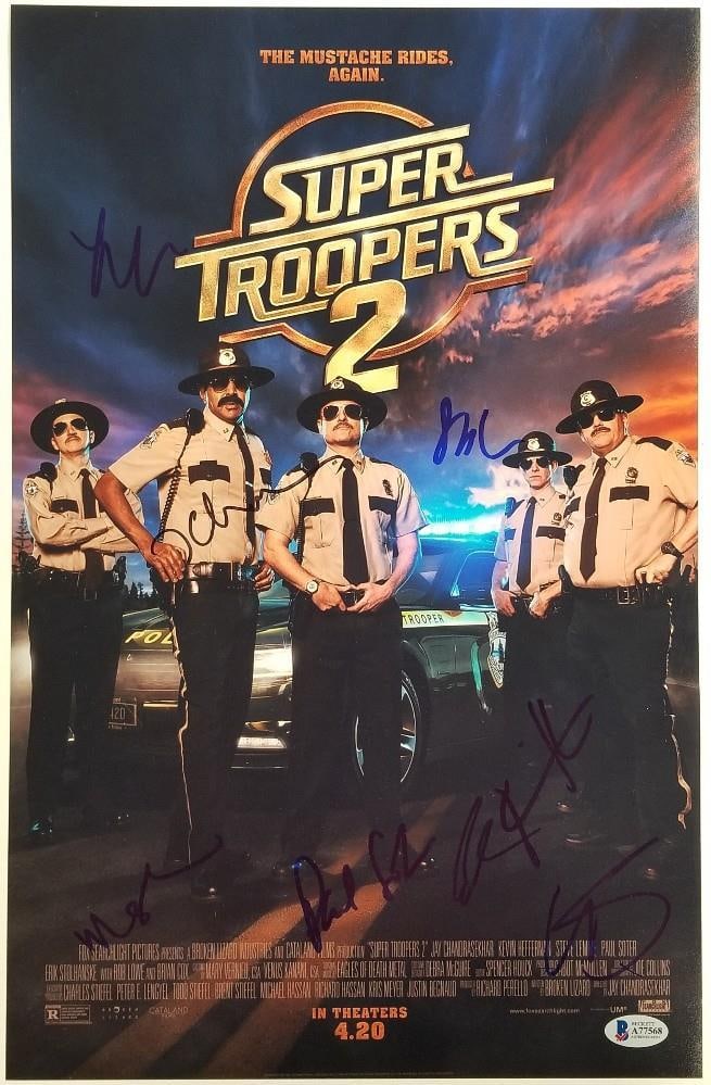 12x18 SUPER TROOPERS 2 Poster Signed by Seven Cast Members with Beckett COA: 12x18 SUPER TROOPERS 2 Poster Signed by Seven Cast Members with Beckett COA This original 12x18 movie poster from Super Troopers 2 is signed by seven cast members. The poster comes with a Beckett BAS 