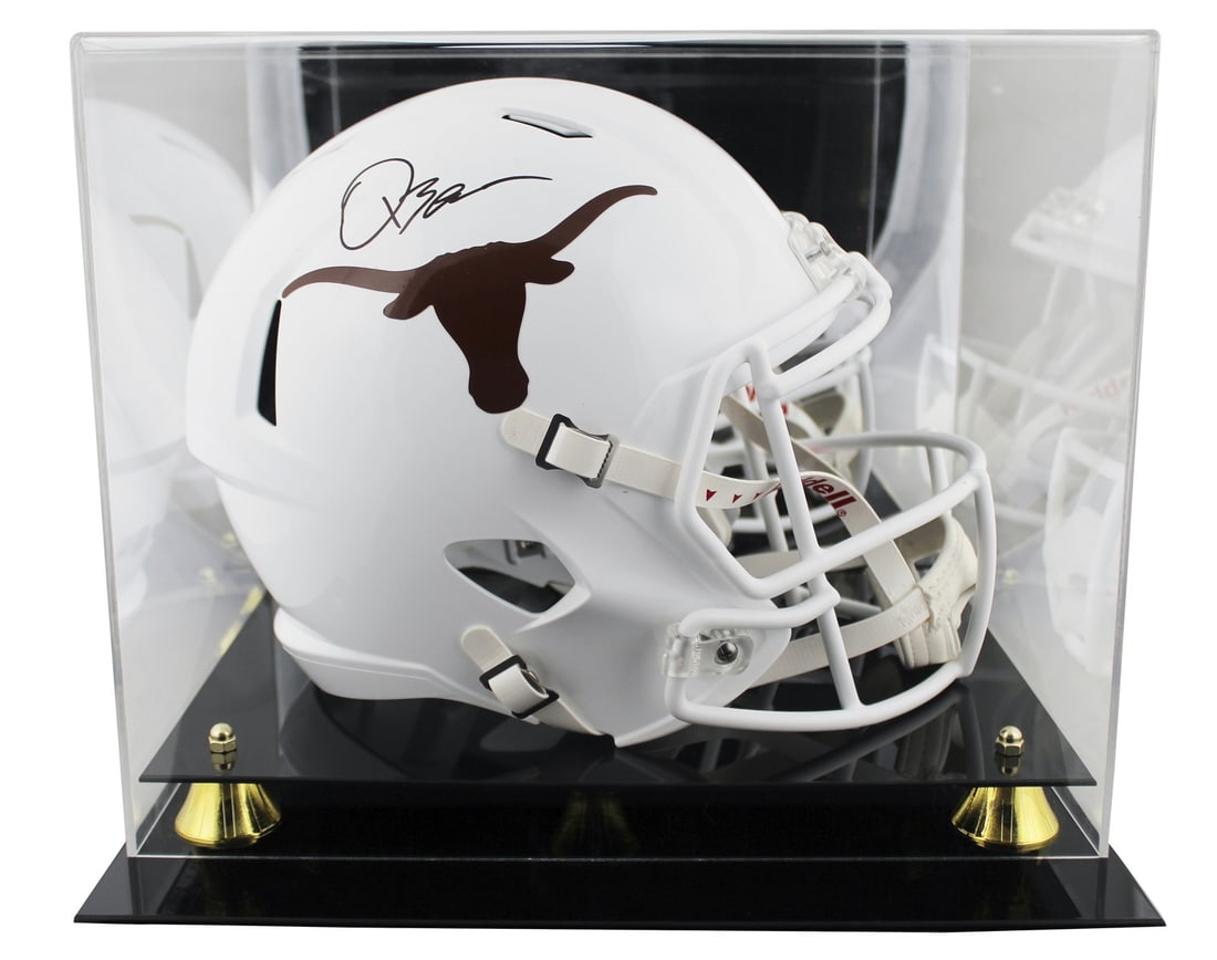 Quinn Ewers Autographed Texas Longhorns Full Size Replica Helmet With BAS and Display Case: Quinn Ewers Autographed Texas Longhorns Full Size Replica Helmet With BAS and Display Case This is a Riddell full size Speed Replica helmet featuring the Texas Longhorns, personally signed by Quinn Ew