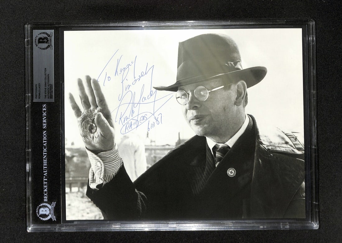 Rare Ronald Lacey Signed 8x10 Photo Arnold Toht Raiders Beckett Authenticated: Rare Ronald Lacey Signed 8x10 Photo Arnold Toht Raiders Beckett Authenticated This rare 8x10 black and white photograph features Ronald Lacey as Arnold Toht from the iconic film Raiders of the Lost Ar