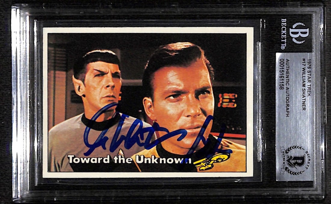 William Shatner Signed 1976 Star Trek #17 Card Beckett Authenticated: William Shatner Signed 1976 Star Trek #17 Card Beckett Authenticated This is a signed non-sports trading card featuring William Shatner, who portrayed Captain Kirk in the iconic Star Trek series. The 