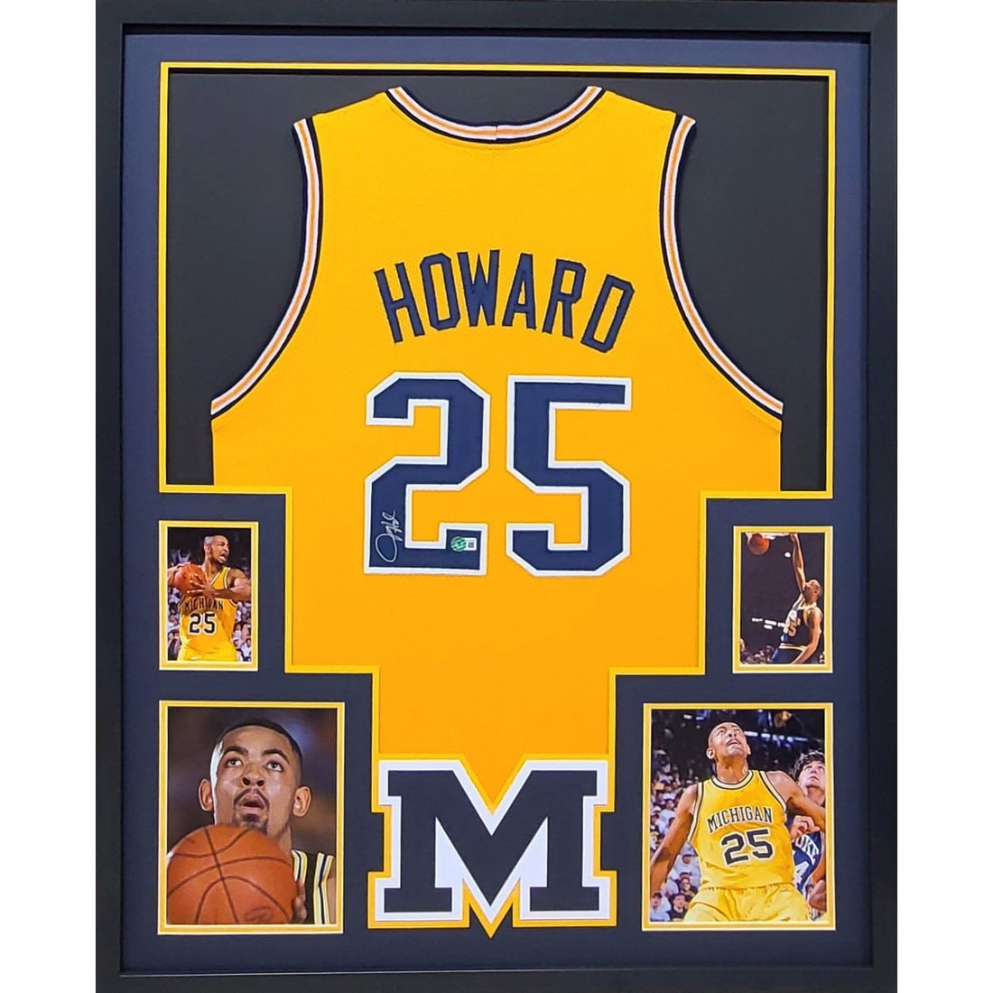 Framed Michigan Wolverines Jersey Signed by Juwan Howard Beckett Authenticated: Framed Michigan Wolverines Jersey Signed by Juwan Howard Beckett Authenticated This is a framed Michigan Wolverines jersey autographed by Juwan Howard. The jersey has been authenticated by Beckett and