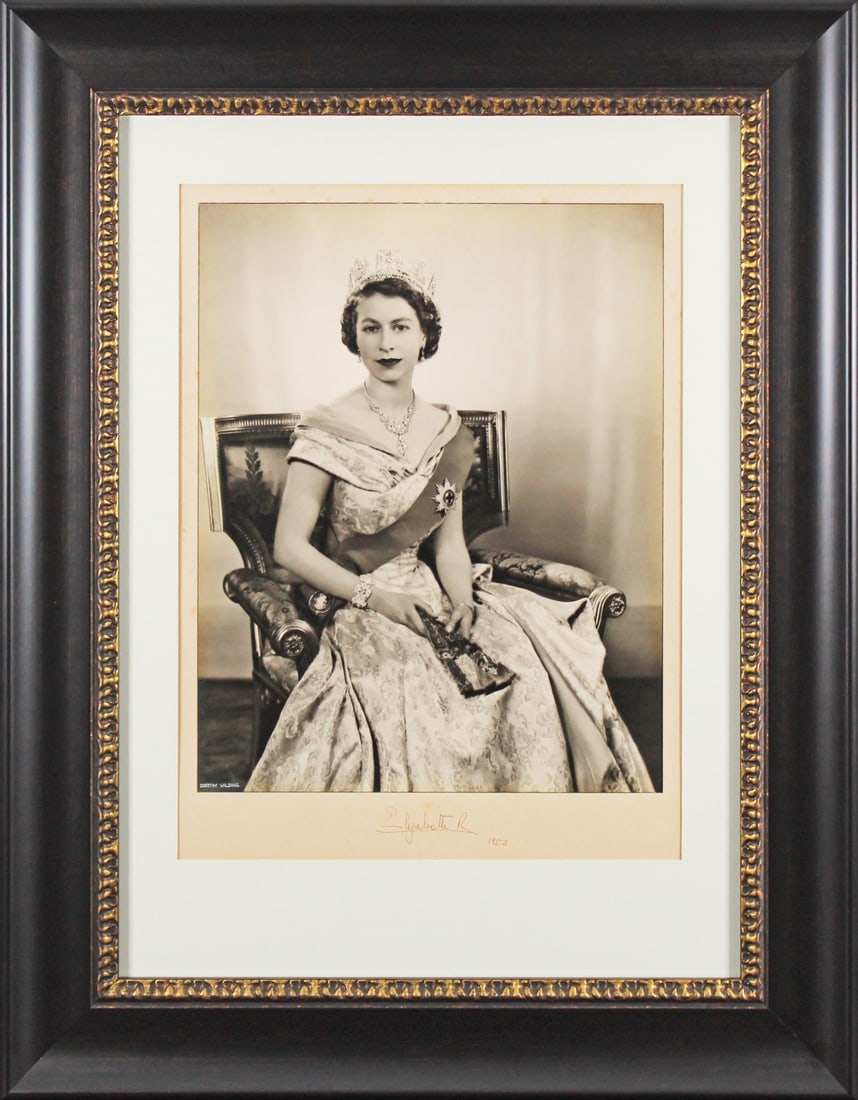 Queen Elizabeth II 1952 Signed Framed 16x20 Photo with Beckett COA: Queen Elizabeth II 1952 Signed Framed 16x20 Photo with Beckett COA This is an authentic signed framed photograph of Queen Elizabeth II featuring the inscription "1952." The 16x20 inch photo is profess
