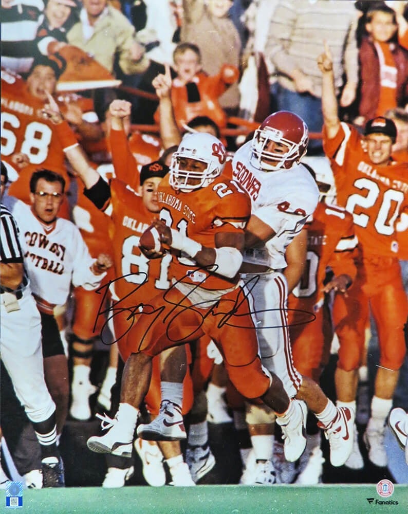 Barry Sanders Signed Oklahoma State 16x20 Photo vs Sooners with COA: Barry Sanders Signed Oklahoma State 16x20 Photo vs Sooners with COA This stunning 16x20 photo captures Barry Sanders in action against the Oklahoma Sooners, showcasing his legendary talent on the fiel