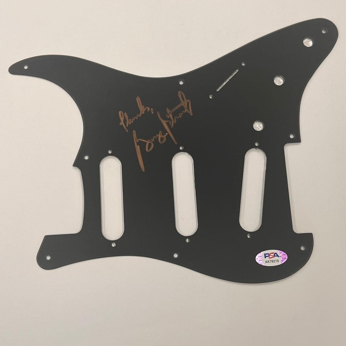 George Strait Signed Pickguard Autographed PSA/DNA Authentic: George Strait Signed Pickguard Autographed PSA/DNA Authentic This original pickguard is autographed by the legendary country singer George Strait. It has been authenticated by PSA/DNA, ensuring the au