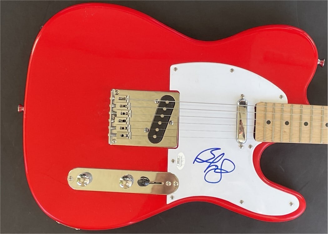 John Doe Autographed Electric Guitar Wild Thing Breathless JSA Authenticated: John Doe Autographed Electric Guitar Wild Thing Breathless JSA Authenticated This is an autographed electric guitar by John Doe, featuring the iconic Wild Thing and Breathless designs. The signature h