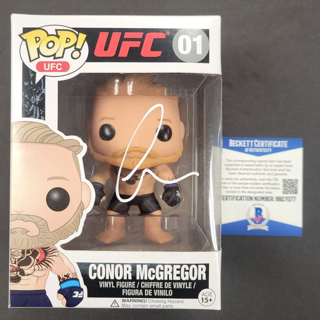 Funko Pop vinyl figure signed by Conor McGregor with Beckett BAS authentication: Funko Pop vinyl figure signed by Conor McGregor with Beckett BAS authentication This Funko Pop! vinyl figure features Conor McGregor and has been hand-signed. The autograph is authenticated by Beckett