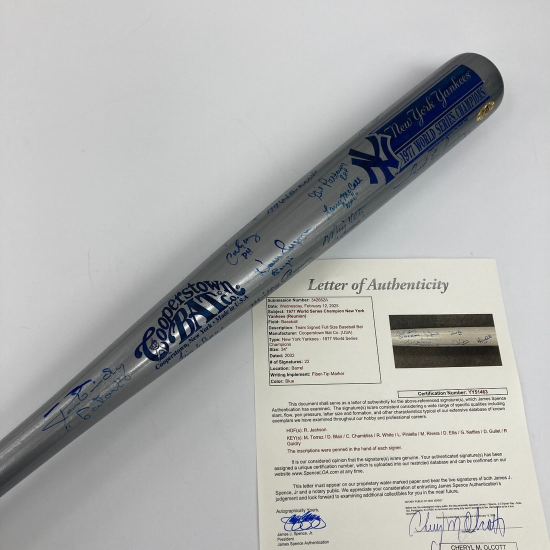 1977 New York Yankees Team Signed Bat with 22 Inscriptions JSA COA: 1977 New York Yankees Team Signed Bat with 22 Inscriptions JSA COA Celebrate the legacy of the 1977 New York Yankees World Series champions with this remarkable silver Cooperstown Bat Co. bat, signed 
