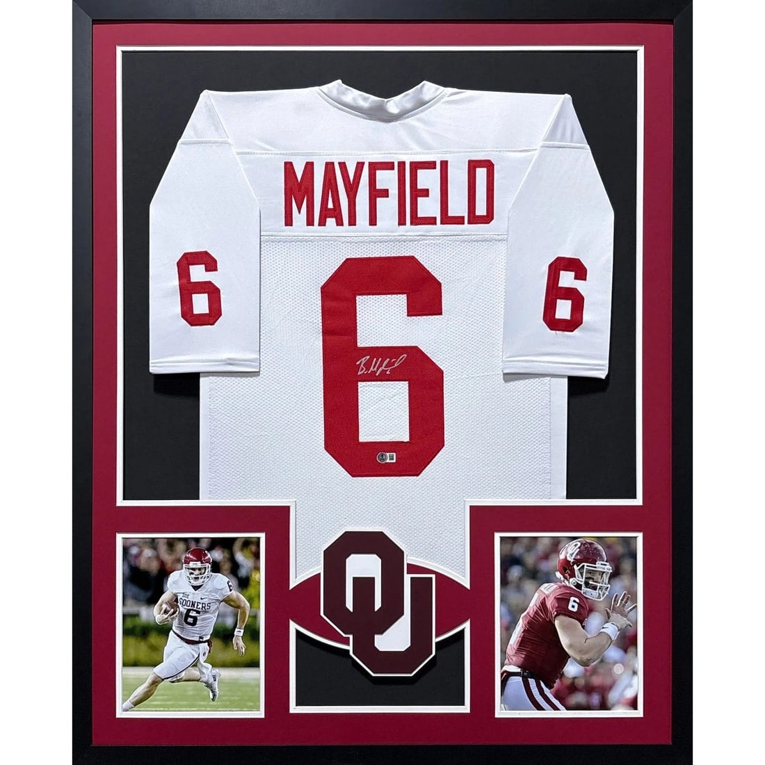 Framed Oklahoma White Jersey Signed by Baker Mayfield with Beckett Authentication: Framed Oklahoma White Jersey Signed by Baker Mayfield with Beckett Authentication This pre-owned Oklahoma Sooners white jersey is framed and signed by Baker Mayfield. The jersey features an autograph 