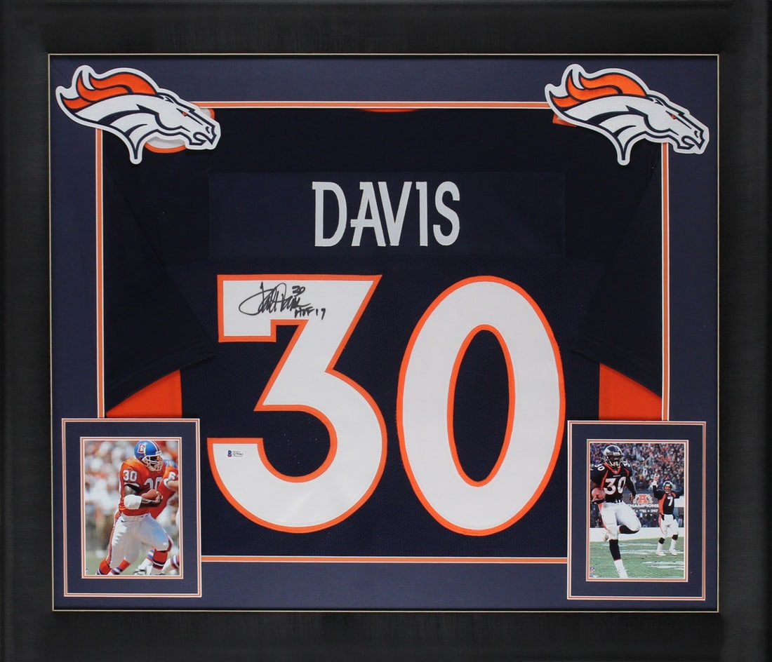 Terrell Davis Signed Navy Blue Framed Jersey HOF 17 Beckett Authenticated: Terrell Davis Signed Navy Blue Framed Jersey HOF 17 Beckett Authenticated Celebrate the legacy of Terrell Davis with this autographed Navy Blue Pro Style Framed Jersey, featuring the inscription "HOF 