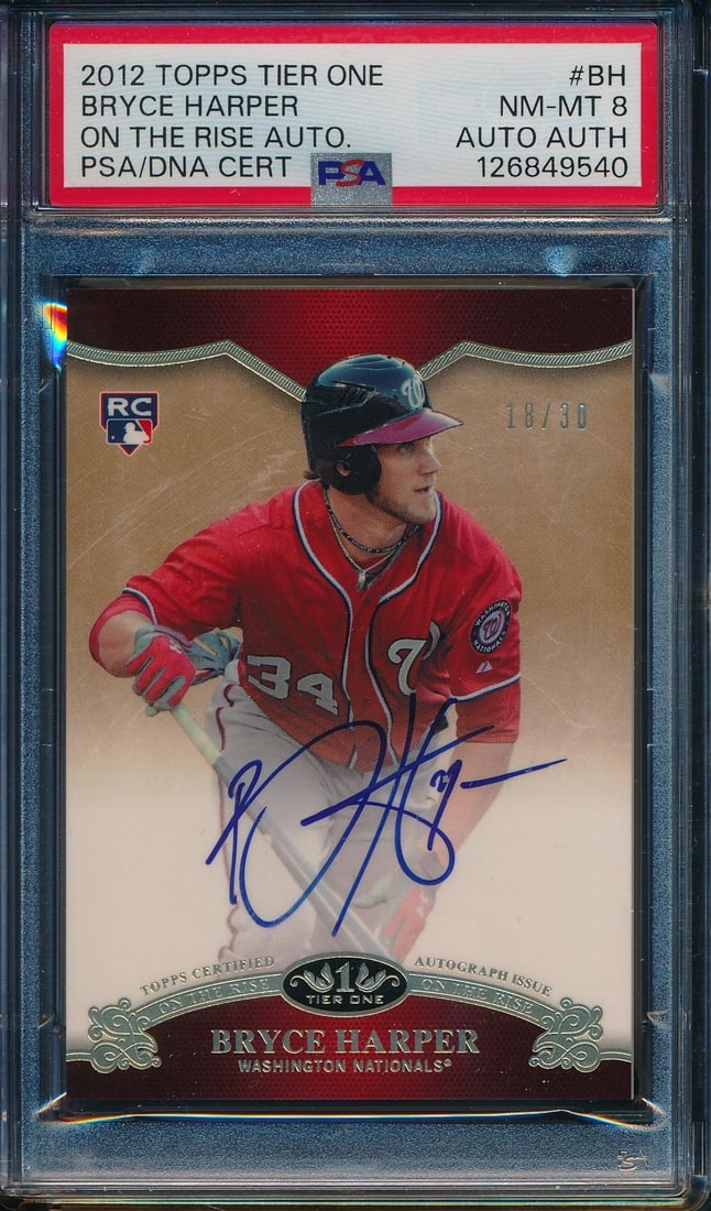 2012 TOPPS Tier One Bryce Harper On Card Auto 19/30 PSA 8: 2012 TOPPS Tier One Bryce Harper On Card Auto 19/30 PSA 8 Offered is a 2012 TOPPS Tier One Bryce Harper On the Rise Autographed Card #OR-BH 19/30 featuring the Washington Nationals. This original phot