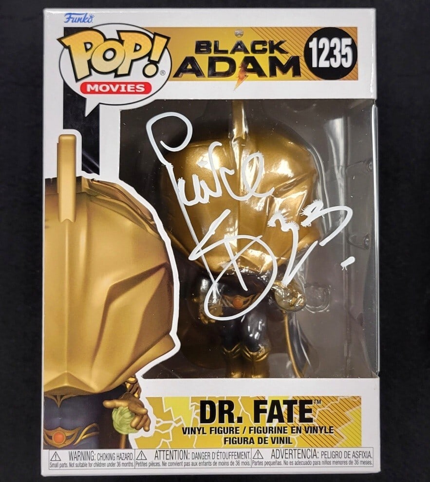 Dr. Fate Black Adam Funko Pop signed by Pierce Brosnan Beckett authenticated: Dr. Fate Black Adam Funko Pop signed by Pierce Brosnan Beckett authenticated This is an original Dr. Fate Black Adam Funko Pop! figure autographed by Pierce Brosnan. The authenticity of the signature 