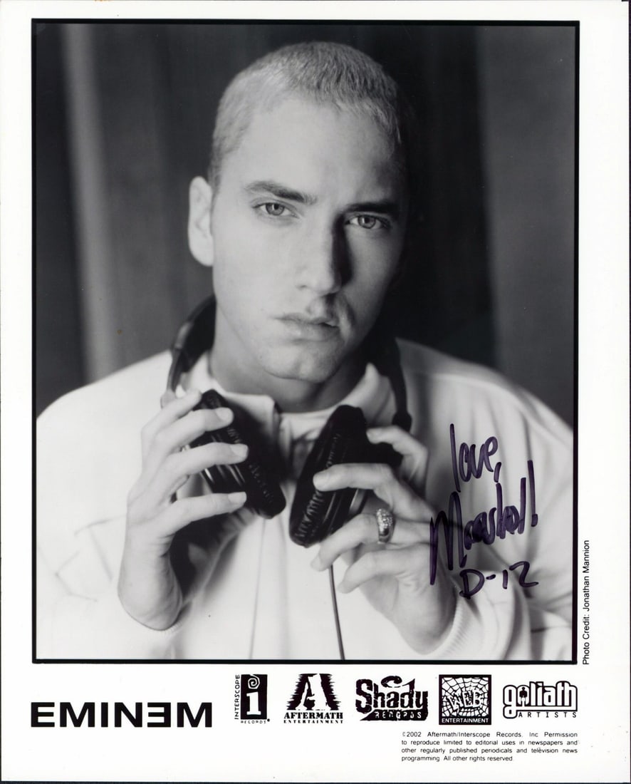 Eminem Signed 8x10 Black and White Promo Photo Beckett Authenticated: Eminem Signed 8x10 Black and White Promo Photo Beckett Authenticated This is an original black and white promotional 8x10 photograph personally signed by Eminem, featuring the inscription "Love, D-12.