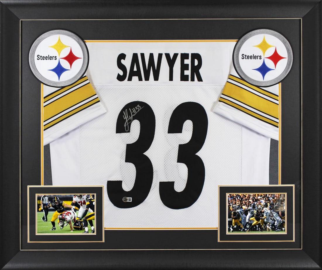 Framed White Pro Style Jersey Jack Sawyer BAS Witnessed: Framed White Pro Style Jersey Jack Sawyer BAS Witnessed This professionally framed white pro style jersey features the authentic signature of Jack Sawyer from the Pittsburgh Steelers. The jersey is cu