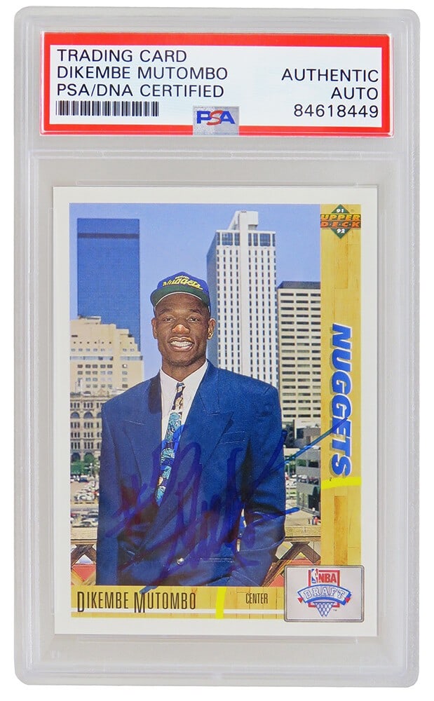 Dikembe Mutombo Signed 1991-92 Upper Deck Rookie Card #3 PSA Encapsulated: Dikembe Mutombo Signed 1991-92 Upper Deck Rookie Card #3 PSA Encapsulated Celebrate the legacy of Dikembe Mutombo with this autographed 1991-92 Upper Deck Rookie Card #3. Encapsulated by PSA, this car