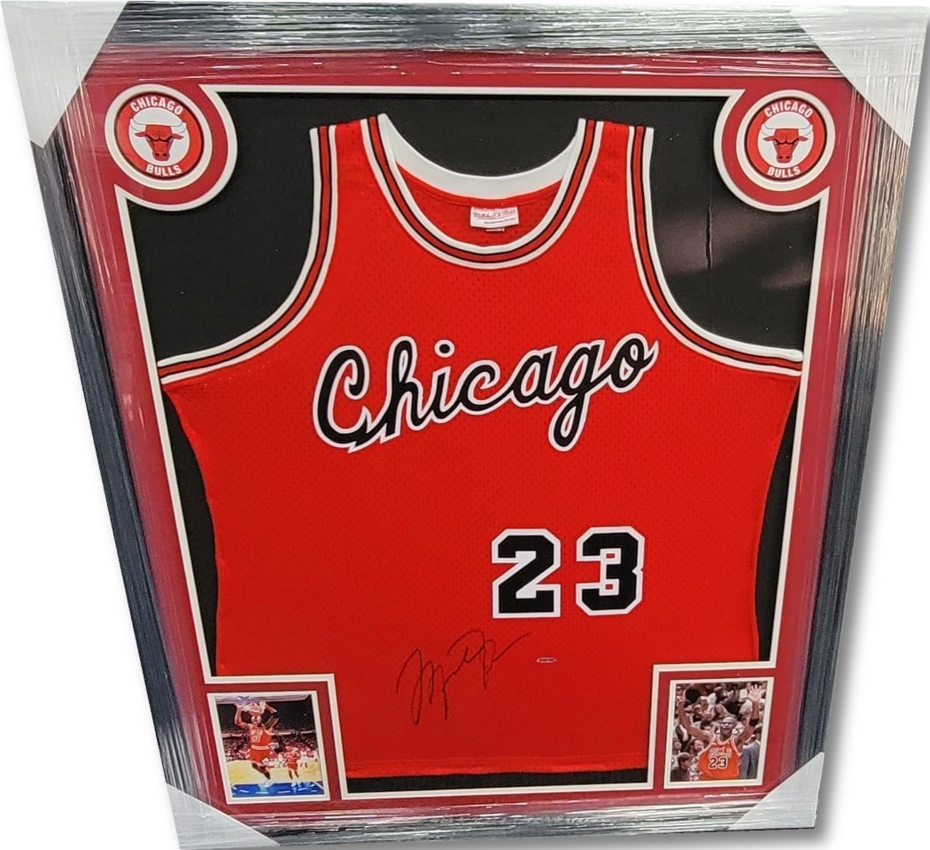 Michael Jordan Autographed 35x43 Framed Rookie Jersey Chicago Bulls Upper Deck Authenticated: Michael Jordan Autographed 35x43 Framed Rookie Jersey Chicago Bulls Upper Deck Authenticated Celebrate basketball history with this Michael Jordan autographed rookie jersey, expertly framed and measur