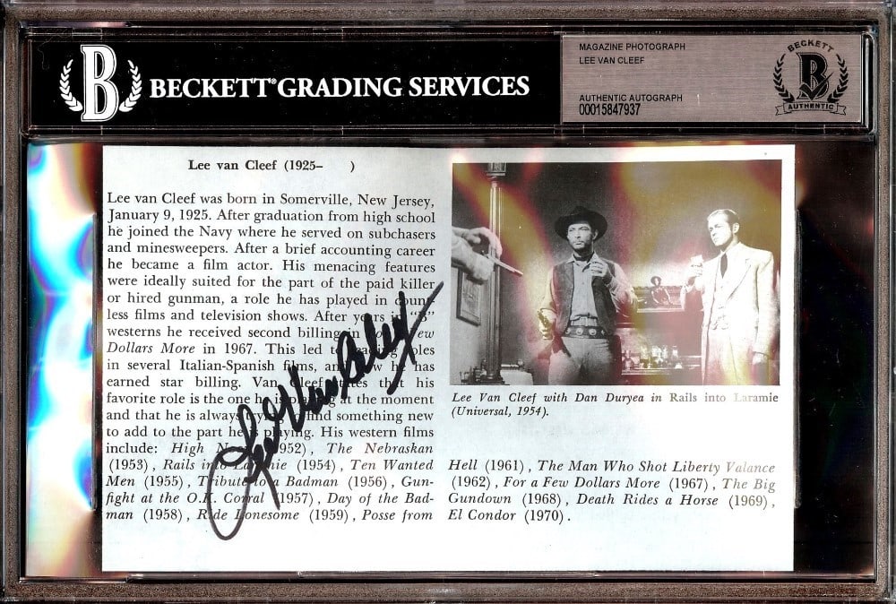 Lee Van Cleef Signed Magazine Photograph with Beckett Authentication Slab: Lee Van Cleef Signed Magazine Photograph with Beckett Authentication Slab This is an original magazine photo from "Rails into Laramie" autographed by Lee Van Cleef. The photograph is authenticated by 