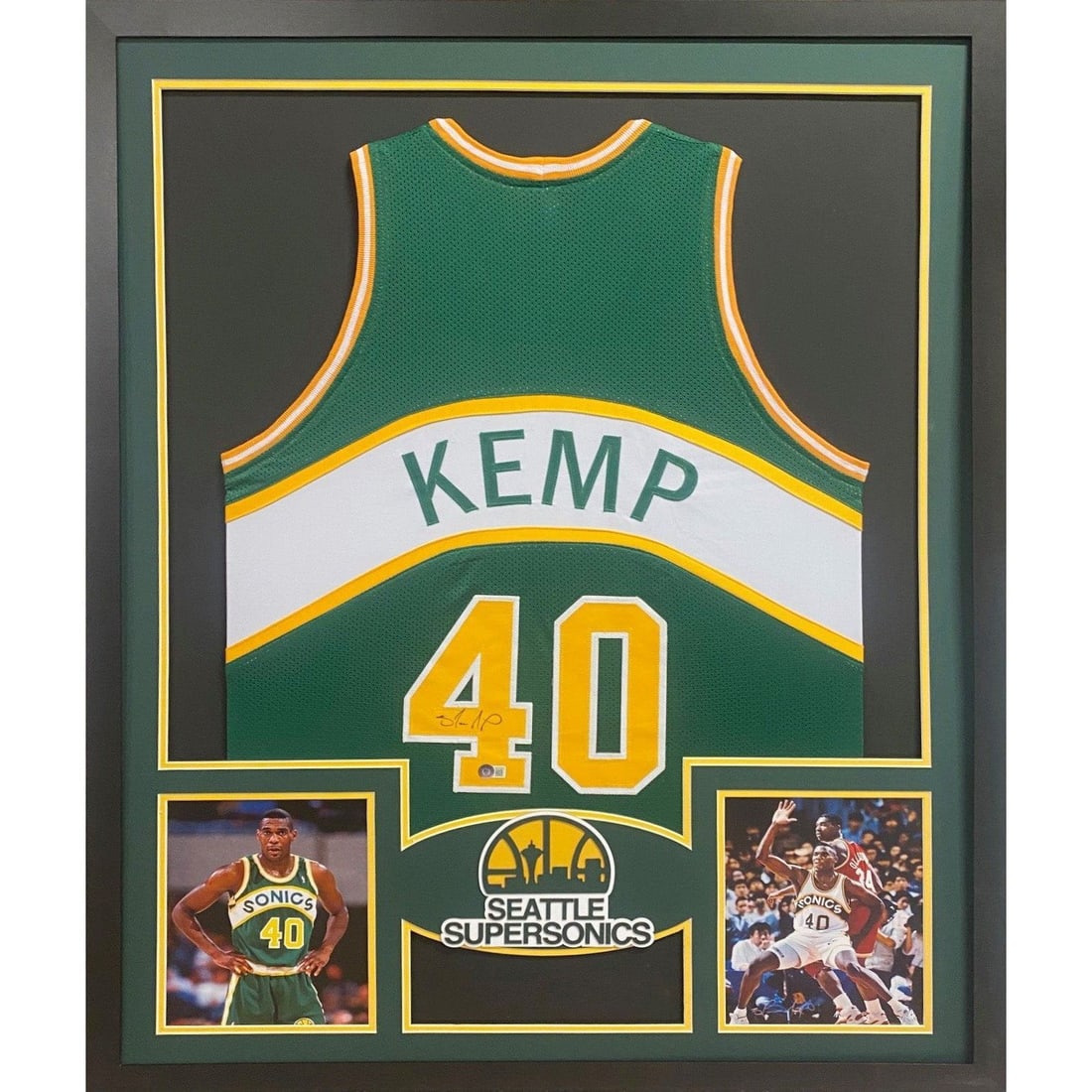 Shawn Kemp Signed Framed Jersey Seattle Supersonics Beckett Authenticated: Shawn Kemp Signed Framed Jersey Seattle Supersonics Beckett Authenticated This is a framed autographed jersey of Shawn Kemp, a legendary player of the Seattle Supersonics. The jersey is authenticated 