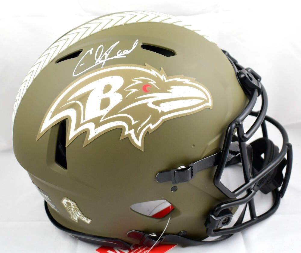Baltimore Ravens Ed Reed autographed full size Speed helmet BAS: Baltimore Ravens Ed Reed autographed full size Speed helmet BAS This is a Baltimore Ravens full-size Salute to Service Speed Authentic helmet signed by Ed Reed. The autograph has been authenticated by