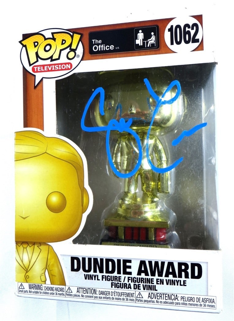PSA authenticated Steve Carell signed The Office Funko Pop figurine: PSA authenticated Steve Carell signed The Office Funko Pop figurine This Funko POP! figurine from The Office features a Dundie Award and has been hand-signed by Steve Carell. The autograph is professi
