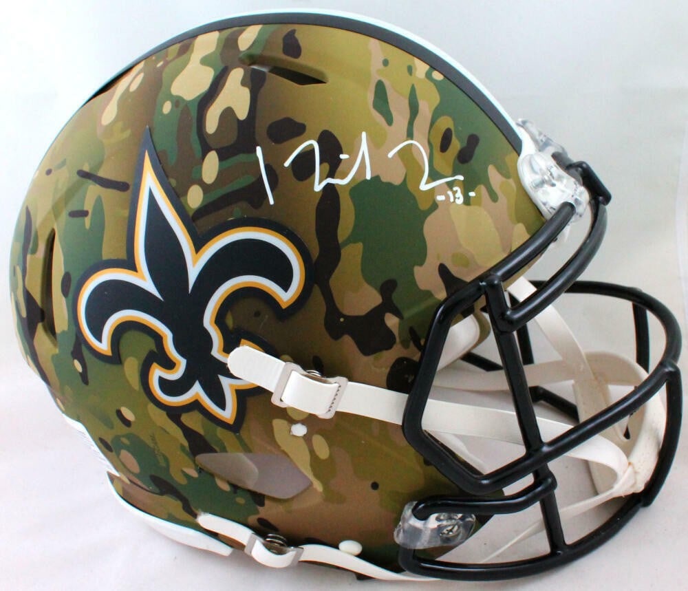 Beckett authenticated Michael Thomas Saints camo full size helmet: Beckett authenticated Michael Thomas Saints camo full size helmet This authentic full-size camouflage helmet features the autograph of Michael Thomas, wide receiver for the New Orleans Saints. The sig