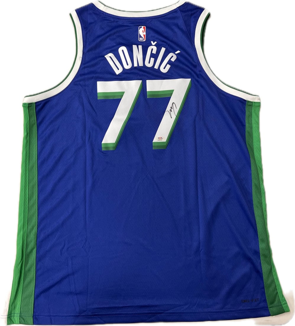 PSA DNA Luka Doncic Autographed Dallas Mavericks Jersey: PSA DNA Luka Doncic Autographed Dallas Mavericks Jersey This Dallas Mavericks jersey is autographed by Luka Doncic and has been authenticated by PSA/DNA. The jersey is a pre-owned item and represents 