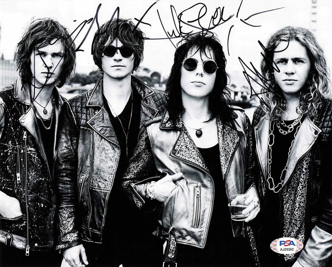 The Struts Signed 8x10 Photo by Gethin Davies Jed Elliott Adam Slack Luke Spiller PSA/DNA: The Struts Signed 8x10 Photo by Gethin Davies Jed Elliott Adam Slack Luke Spiller PSA/DNA This 8x10 photograph features the signatures of Gethin Davies, Jed Elliott, Adam Slack, and Luke Spiller from 