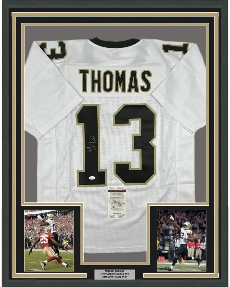 Framed Autographed Michael Thomas Jersey 33x42 JSA COA New Orleans Saints: Framed Autographed Michael Thomas Jersey 33x42 JSA COA New Orleans Saints Celebrate the remarkable career of Michael Thomas with this professionally framed and signed New Orleans Saints white jersey. 