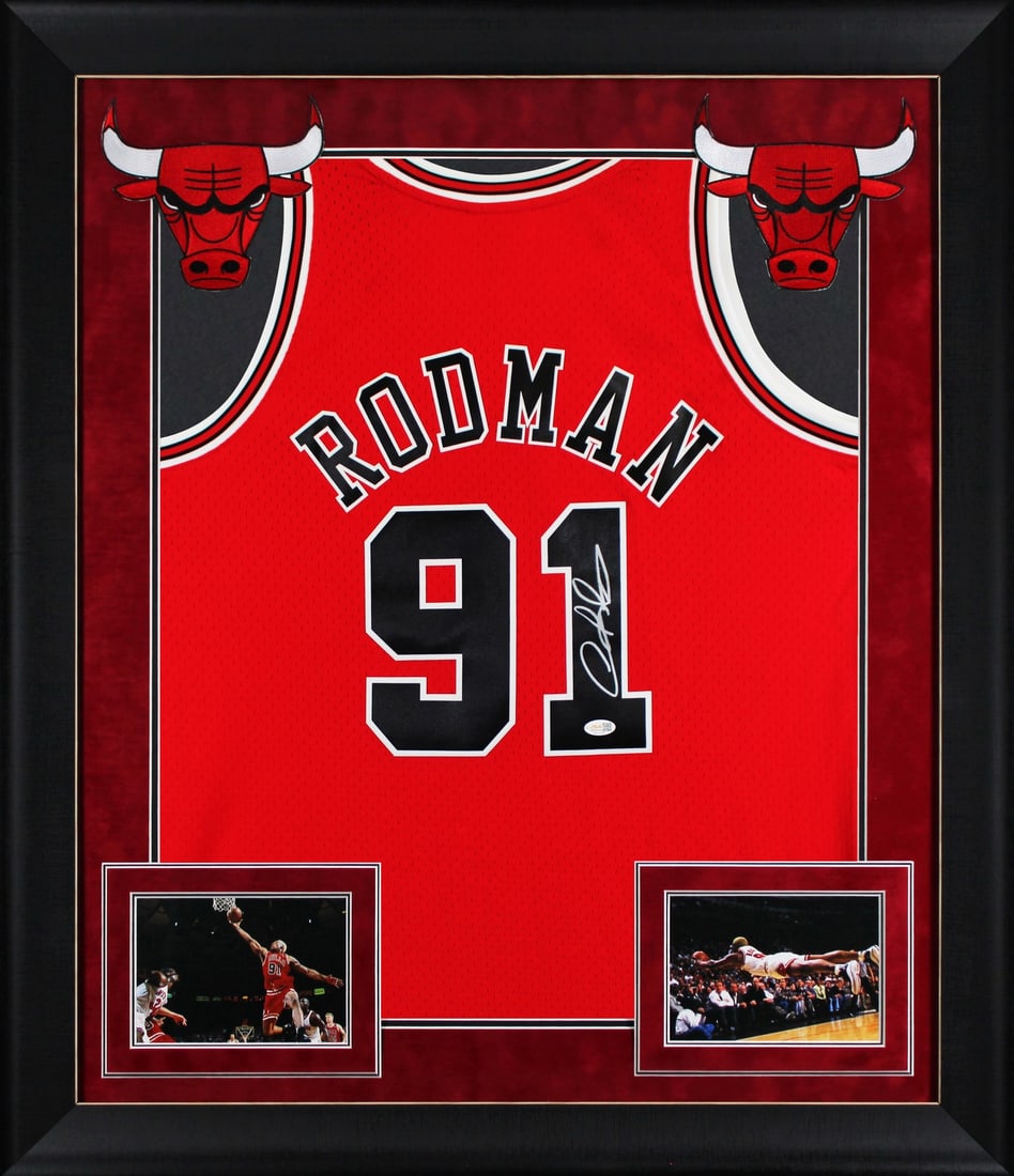 Framed Dennis Rodman signed Chicago Bulls jersey JSA witnessed: Framed Dennis Rodman signed Chicago Bulls jersey JSA witnessed This professionally framed red Mitchell & Ness Hardwood Classics Swingman jersey features the authentic signature of Dennis Rodman from t