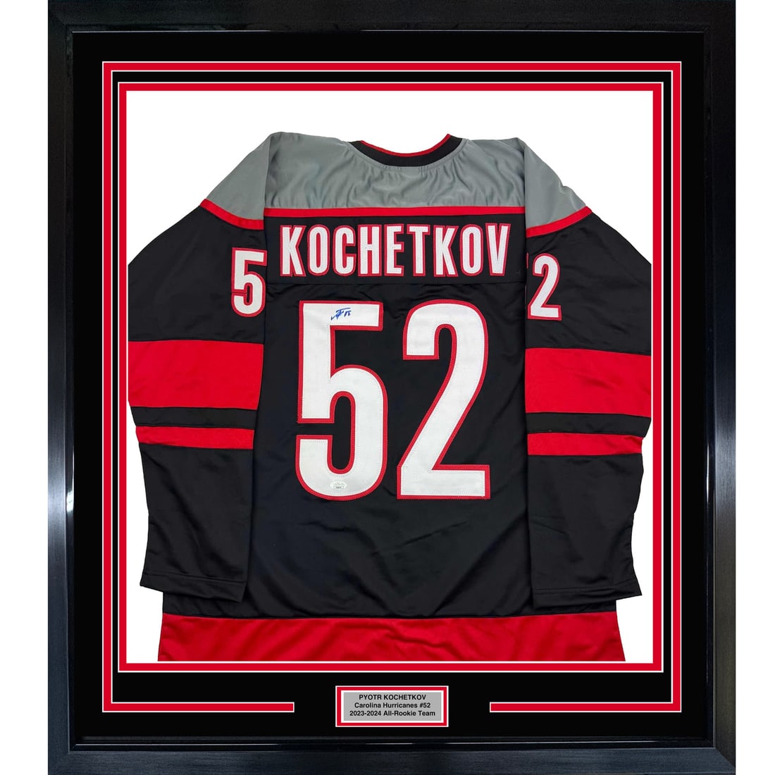 Framed Pyotr Kochetkov Signed Carolina Hurricanes Jersey JSA COA 35x39: Framed Pyotr Kochetkov Signed Carolina Hurricanes Jersey JSA COA 35x39 This professionally framed and matted display features an autographed Pyotr Kochetkov Carolina Hurricanes black jersey, making it