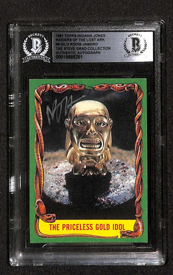 Beckett slabbed 1981 Topps Raiders of the Lost Ark card signed by Nilo Rodis-Jamero: Beckett slabbed 1981 Topps Raiders of the Lost Ark card signed by Nilo Rodis-Jamero This is a 1981 Topps Indiana Jones: Raiders of the Lost Ark trading card, featuring "The Priceless Gold Idol" (#9), 