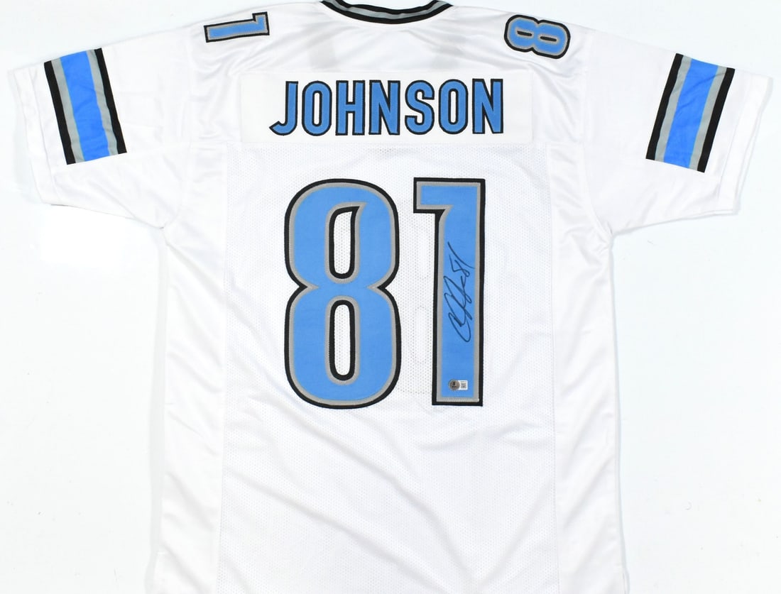 Detroit Lions Calvin Johnson Signed White Jersey Beckett W Authentication: Detroit Lions Calvin Johnson Signed White Jersey Beckett W Authentication This is a white pro style football jersey autographed by Calvin Johnson. The autograph is authenticated with a Beckett W holog
