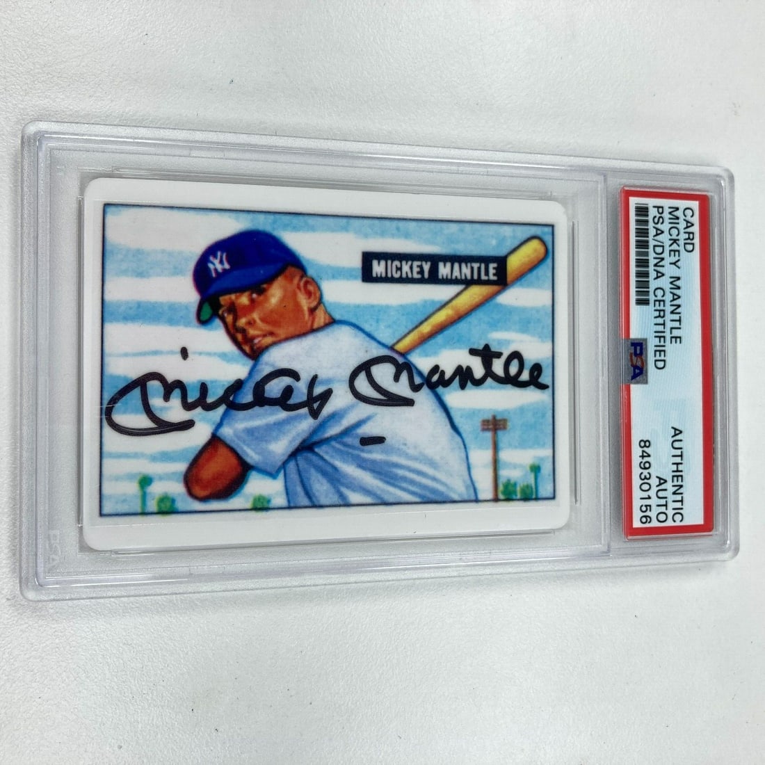 1951 Bowman Mickey Mantle Signed Porcelain Rookie Card PSA Certified: 1951 Bowman Mickey Mantle Signed Porcelain Rookie Card PSA Certified This is a 1951 Bowman Mickey Mantle Signed Porcelain Baseball Card, a must-have for any serious baseball card collector. This rare 
