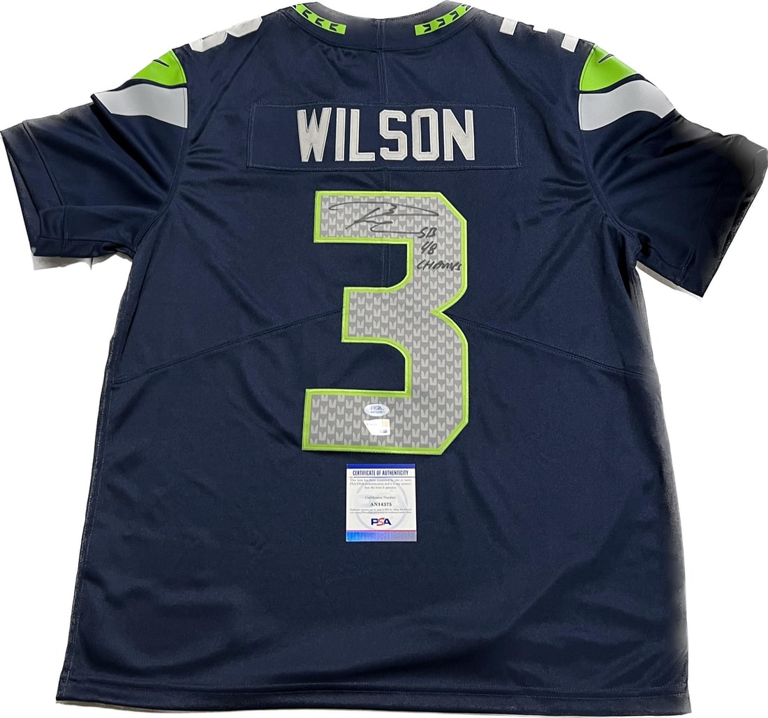 Seattle Seahawks Russell Wilson PSA/DNA Authenticated Signed Super Bowl Champion Jersey: Seattle Seahawks Russell Wilson PSA/DNA Authenticated Signed Super Bowl Champion Jersey This is a pre-owned, stitched Seattle Seahawks football jersey signed by Russell Wilson. The autograph has been 