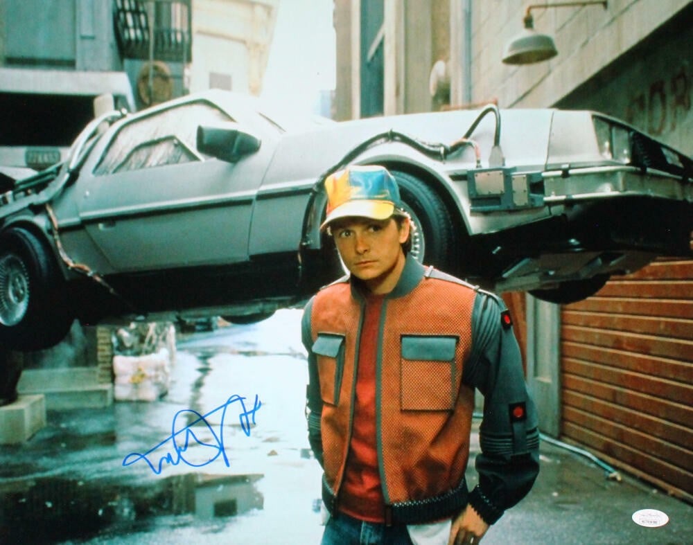 Back to the Future 16x20 Michael J Fox signed photo JSA: Back to the Future 16x20 Michael J Fox signed photo JSA This is a 16x20 photograph featuring a close-up scene from the movie "Back to the Future." The photo is autographed by Michael J. Fox and comes 