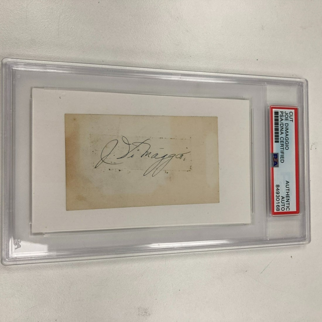 1936 Joe DiMaggio Rookie Signed Index Card PSA Certified: 1936 Joe DiMaggio Rookie Signed Index Card PSA Certified This is a 1936 rookie index card signed by legendary baseball player Joe DiMaggio. The card, authenticated by Professional Sports Authenticator